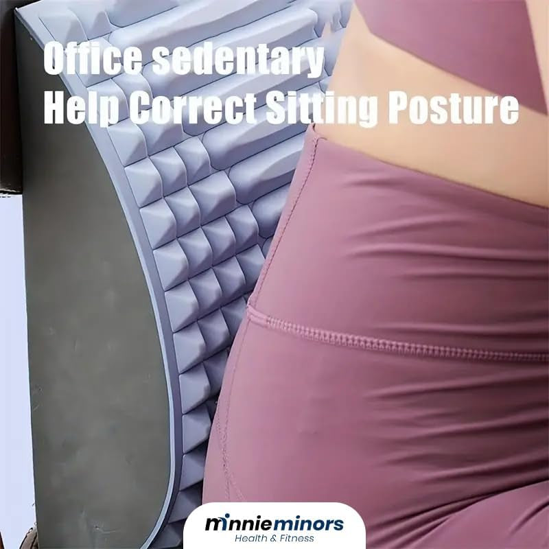 Person lying on the back stretcher decompressing the lumbar spine